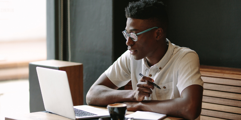 Business owner working at a coffee shop.