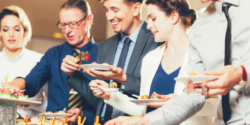 Employees enjoying a catered lunch