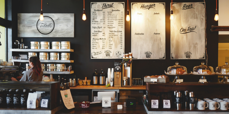 Coffee shop showing logo and menu.