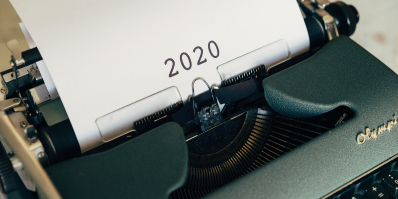 Typewriter with the numbers 2020 on a sheet. 